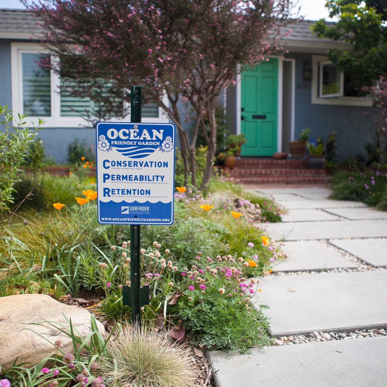photo of an ocean friendly garden with a ocean friendly garden sign in front