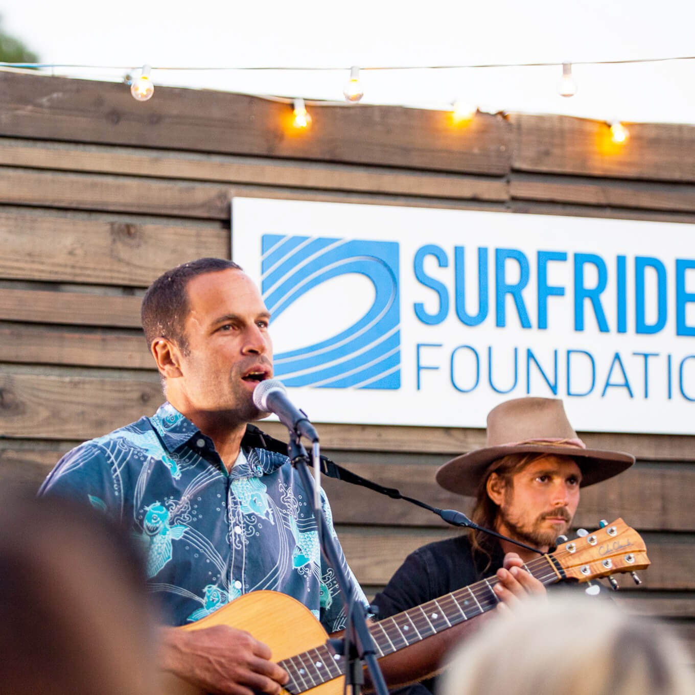 Photo of Jack Johnson & Lucas Nelson performing at Surfrider's One Ocean event
