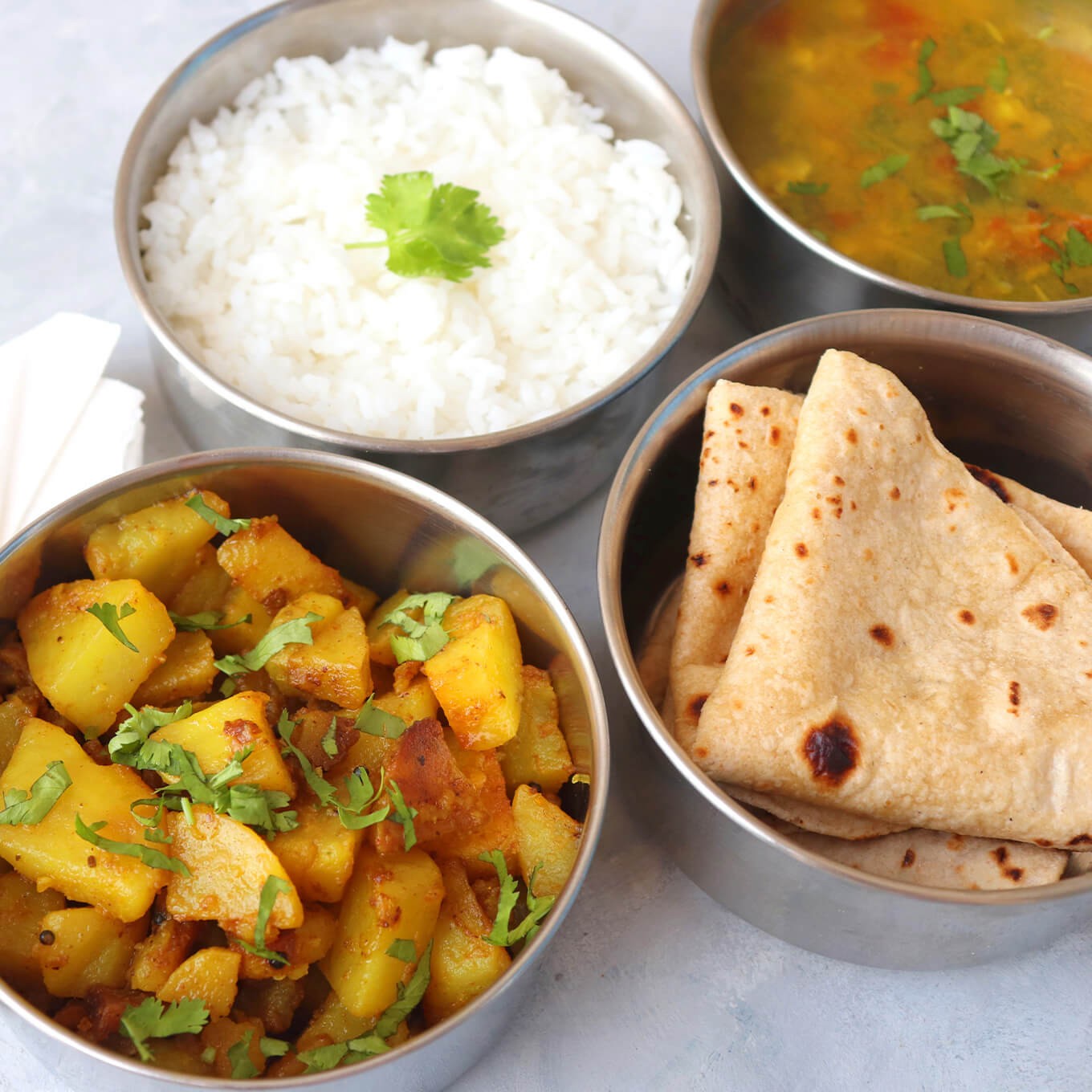 Bowls of fresh warm food on a table